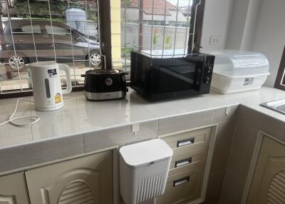 Kitchen with appliances on countertop