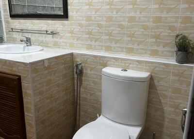 Well-lit bathroom with modern fixtures