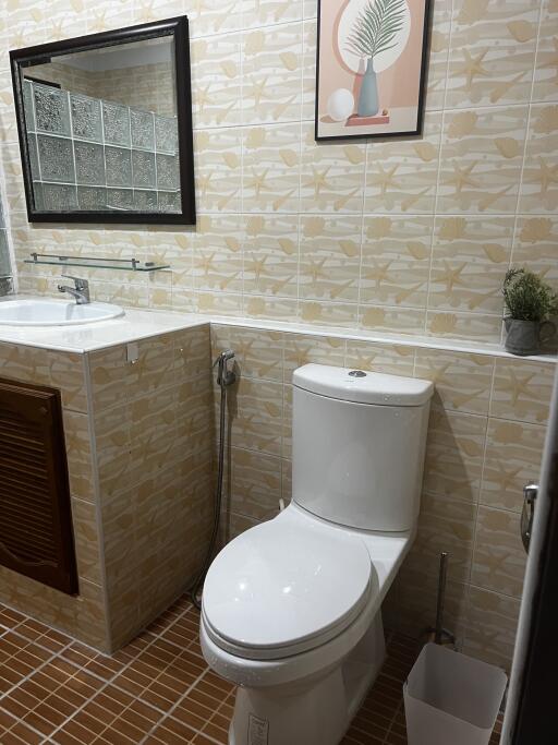 Well-lit bathroom with modern fixtures