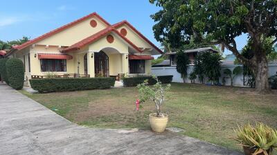 Front view of a house with garden