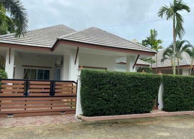 Exterior view of a house with a well-maintained garden