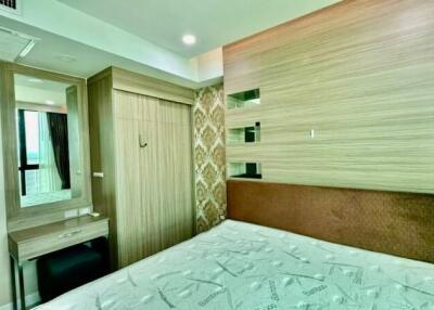 Modern bedroom with fitted wardrobe and dresser