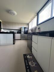 Modern kitchen with sleek cabinets and appliances