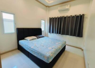 Cozy bedroom with double bed and air conditioning