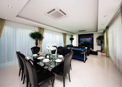 Spacious and modern living room with a dining area