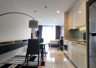 Modern living and dining area with integrated kitchen