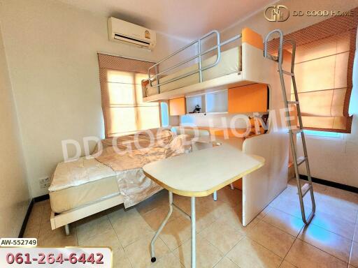 Bedroom with bunk beds and desk