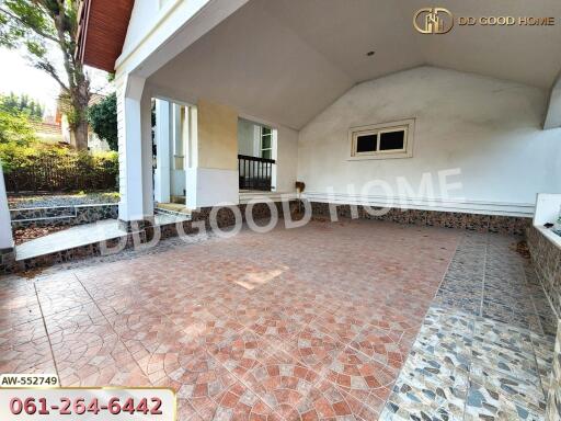 Covered outdoor area with tile flooring