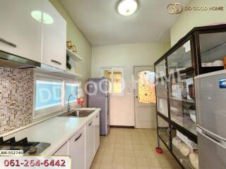 Modern kitchen with white cabinets and appliances