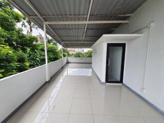 Spacious covered terrace with tiled floor