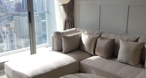 Modern living room with a view of the city skyline