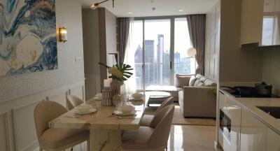 Modern living room with dining area and city view