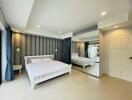 modern bedroom with large mirrored closet and minimalist decor