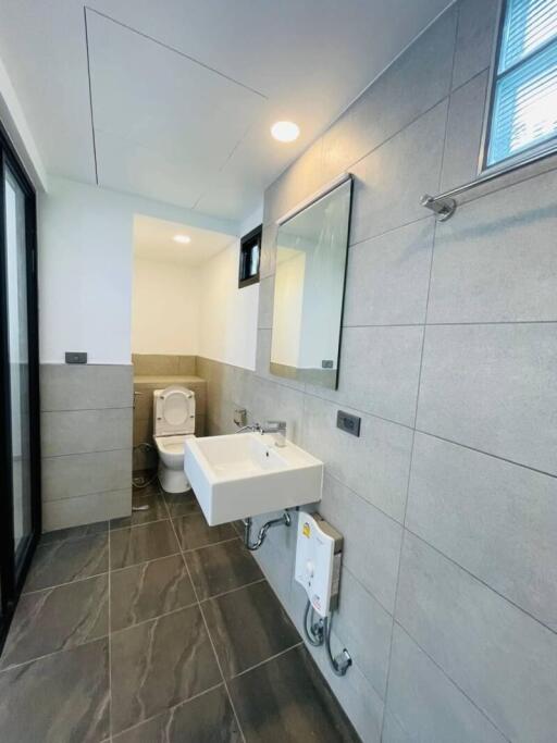 Modern bathroom with toilet and sink