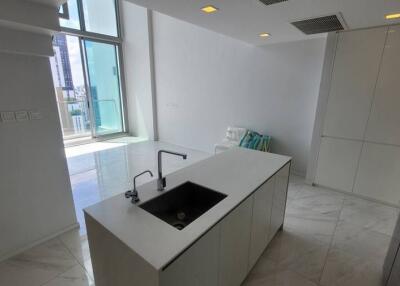 Modern kitchen with island and city view