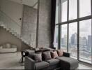 Modern living room with large windows and city view