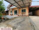 Front view of a house with carport