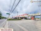 Street view of a commercial building complex near CK 4