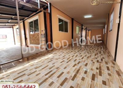 Spacious corridor with tiled flooring