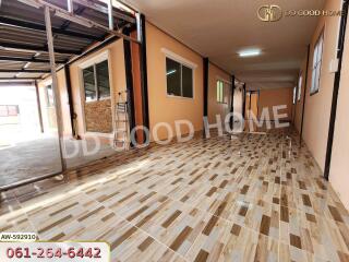 Spacious corridor with tiled flooring