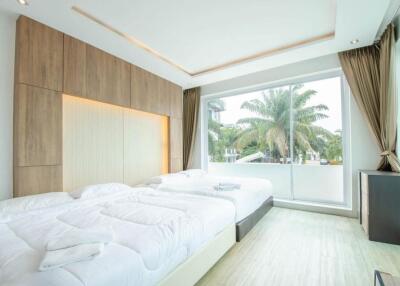 modern bedroom with large window and view