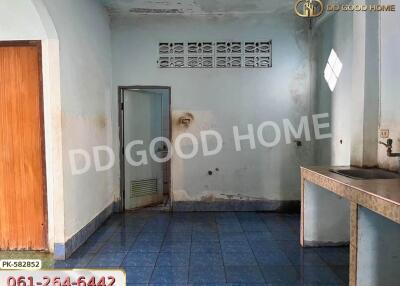 Empty kitchen with tiled floor