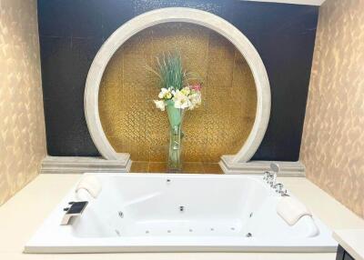 Luxurious bathroom with jacuzzi and stylish decor