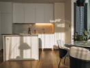 Modern kitchen with dining area and ample natural light