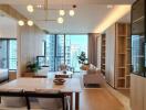 Modern living room with dining area and floor-to-ceiling windows