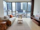 Modern living room with floor-to-ceiling windows and city view