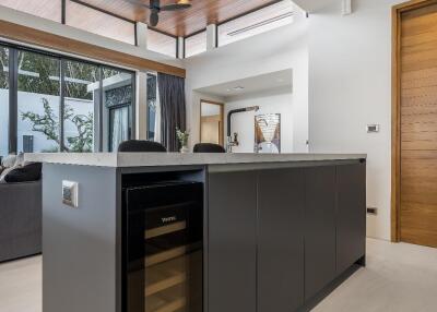 Modern kitchen with wine cooler and island