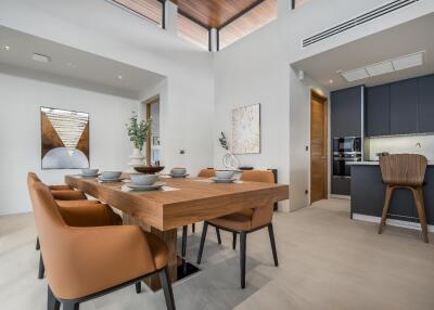 Modern dining room with wooden table and orange chairs