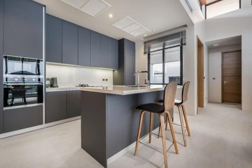 Modern kitchen with island and bar stools