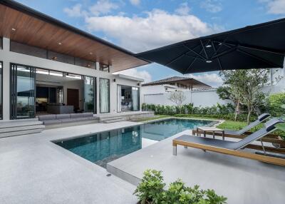 Modern house with swimming pool and patio