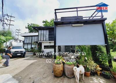 Modern two-story house exterior with driveway