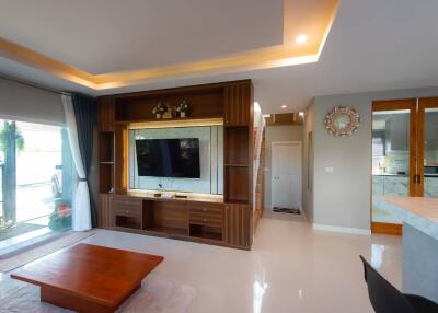 Modern living room with built-in wooden entertainment unit