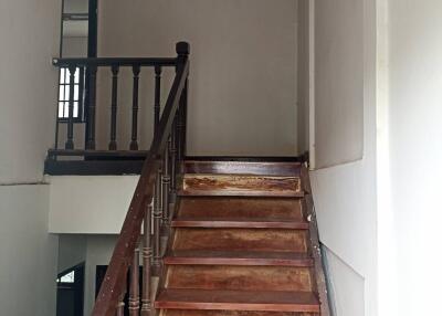 Wooden stairs with railing