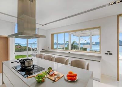 Modern kitchen with island and sea view