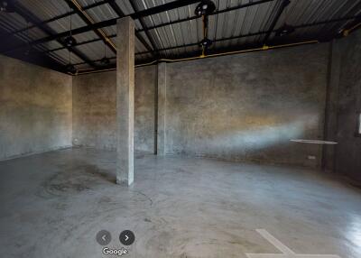 Unfinished interior space with concrete floors and walls