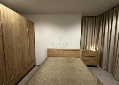 Modern bedroom with wooden furniture