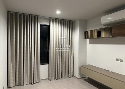 Modern bedroom with air conditioning and minimalist decor