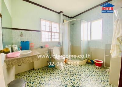 Spacious bathroom with modern fixtures