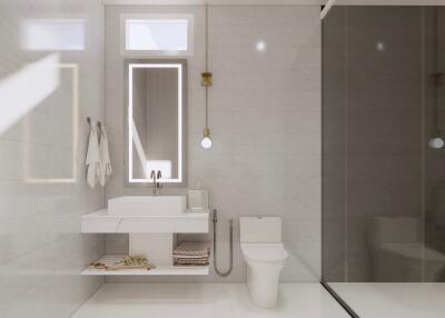 Modern bathroom with white fixtures and glass shower enclosure