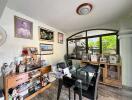 Cozy dining room with personal decorations and ample storage