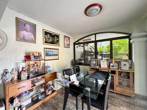 Cozy dining room with personal decorations and ample storage