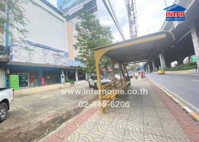 Street view near property location with a bus stop