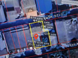 Aerial view of a property with outlined measurements and pin location