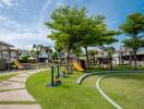 Community playground and park area with greenery