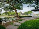 Beautiful outdoor area with bench seating and greenery