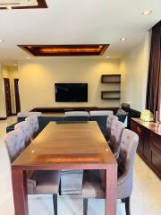 Spacious living and dining area with modern furniture